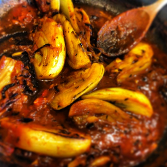 [Leaf Parade. Braised fennel wedges with saffron and tomato.]